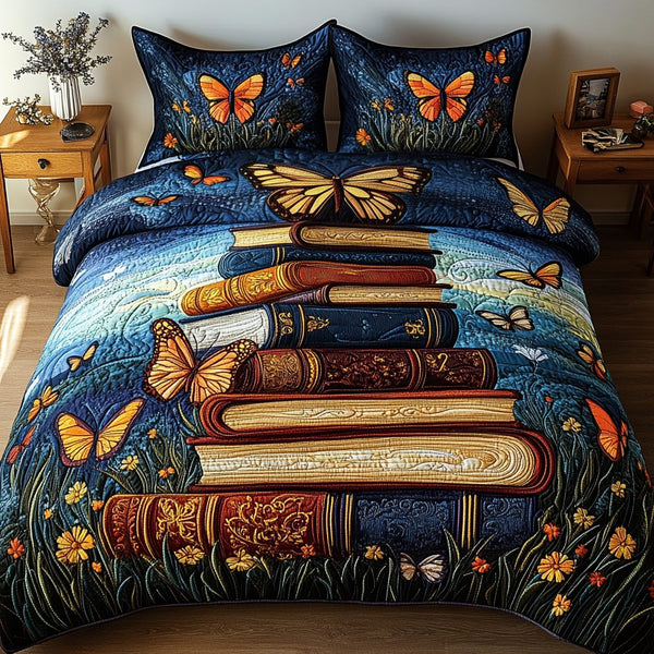 Whimsical Butterfly Stacks quilted 3-piece bedding set on a made bed with two matching pillow shams