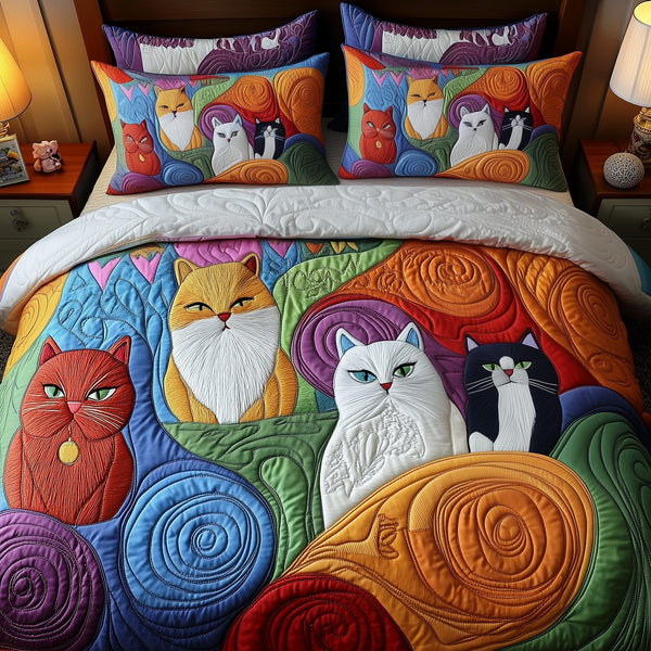 Whimsical Cat quilted 3-piece bedding set on a made bed with two matching pillow shams