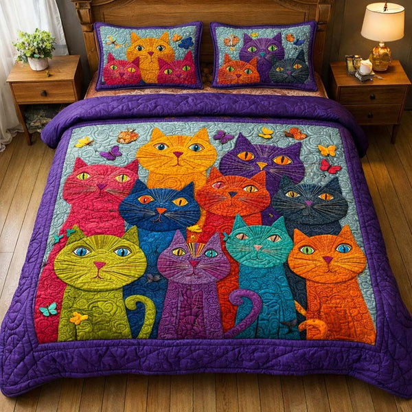 Whimsical Cats quilted 3-piece bedding set on a made bed with two matching pillow shams