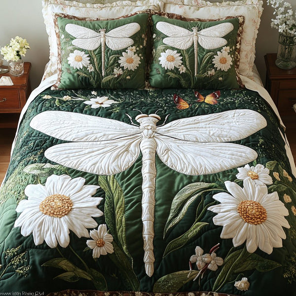 Whimsical Wings quilted 3-piece bedding set on a made bed with two matching pillow shams