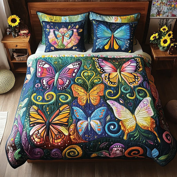 Whimsical Wings quilted 3-piece bedding set on a made bed with two matching pillow shams