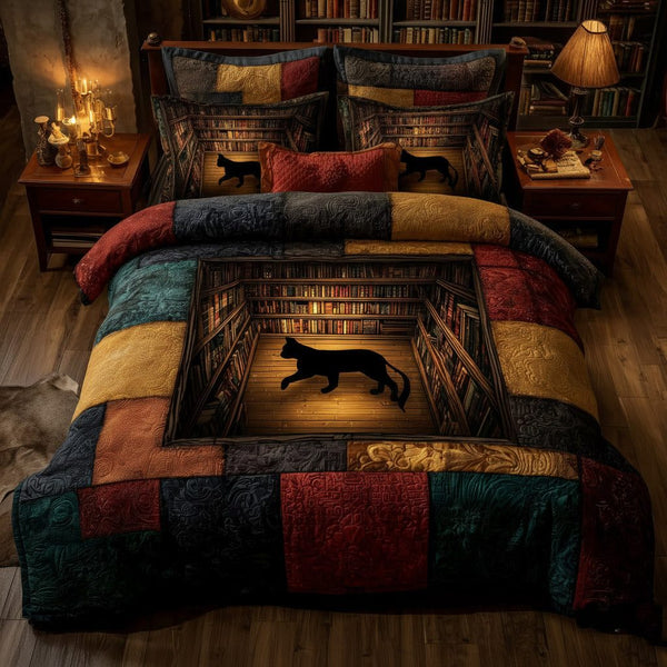 Whiskered Library quilted 3-piece bedding set on a made bed with two matching pillow shams