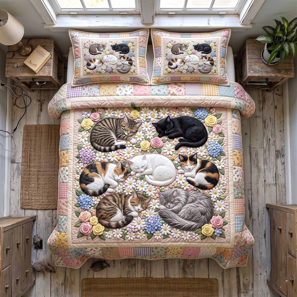 Whiskers Garden quilted 3-piece bedding set on a made bed with two matching pillow shams