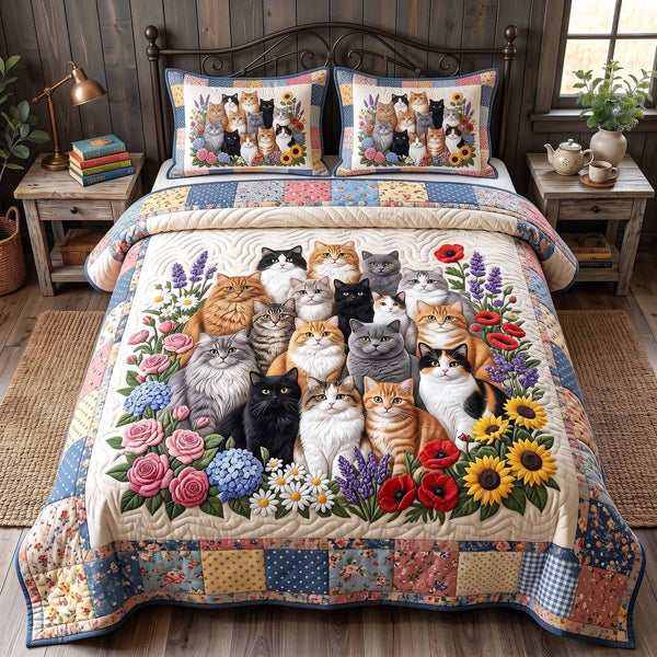 Whiskers Garden quilted 3-piece bedding set on a made bed with two matching pillow shams