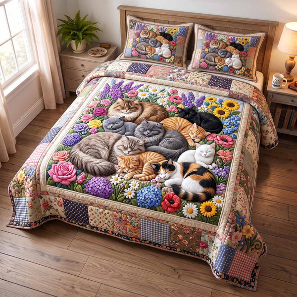 Whiskers Garden quilted 3-piece bedding set on a made bed with two matching pillow shams