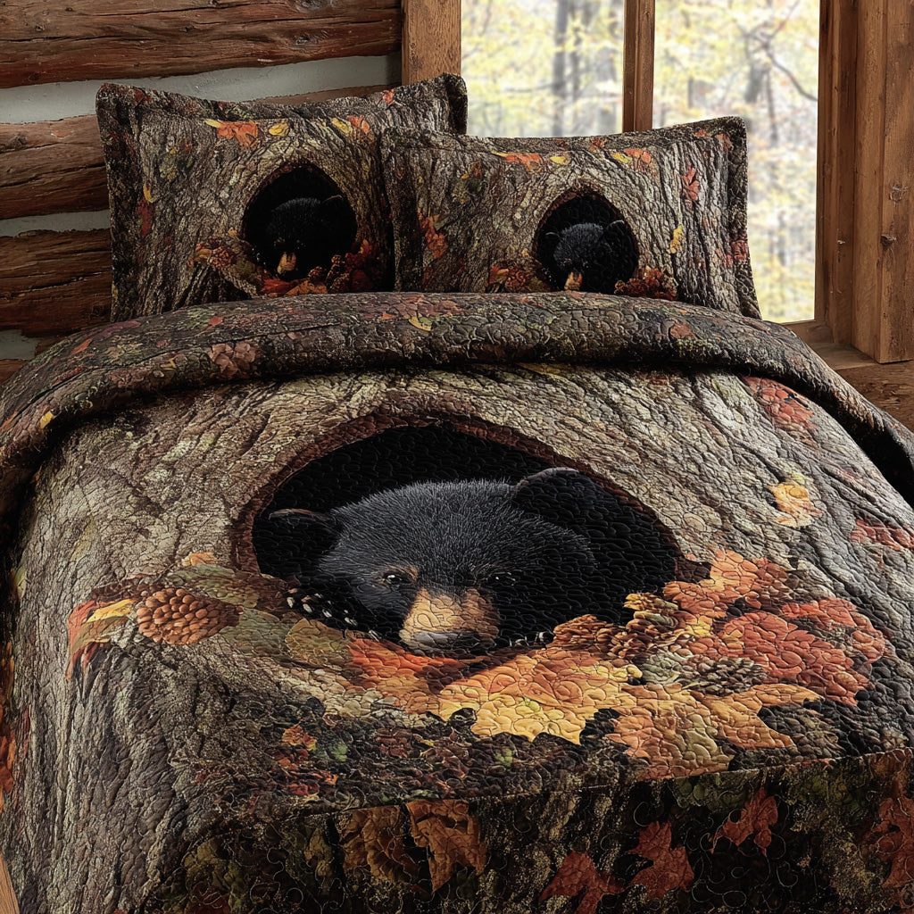 Whispering Black Bear quilted 3-piece bedding set on a made bed with two matching pillow shams