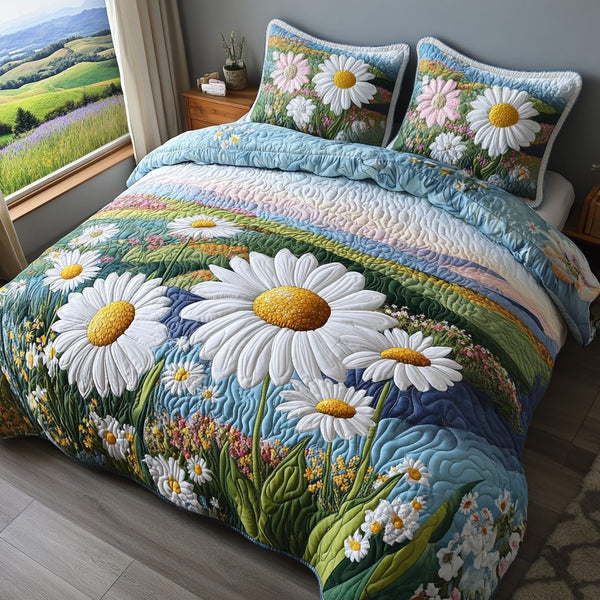 Whispering Daisies quilted 3-piece bedding set on a made bed with two matching pillow shams
