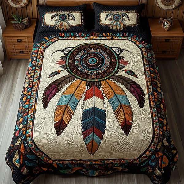 Whispering Feathers quilted 3-piece bedding set on a made bed with two matching pillow shams