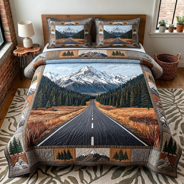 Whispering Pines quilted 3-piece bedding set on a made bed with two matching pillow shams