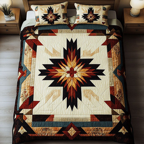 Whispering Winds quilted 3-piece bedding set on a made bed with two matching pillow shams