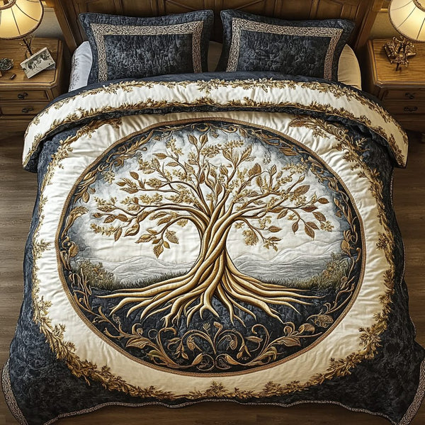 Whispers Of Life quilted 3-piece bedding set on a made bed with two matching pillow shams