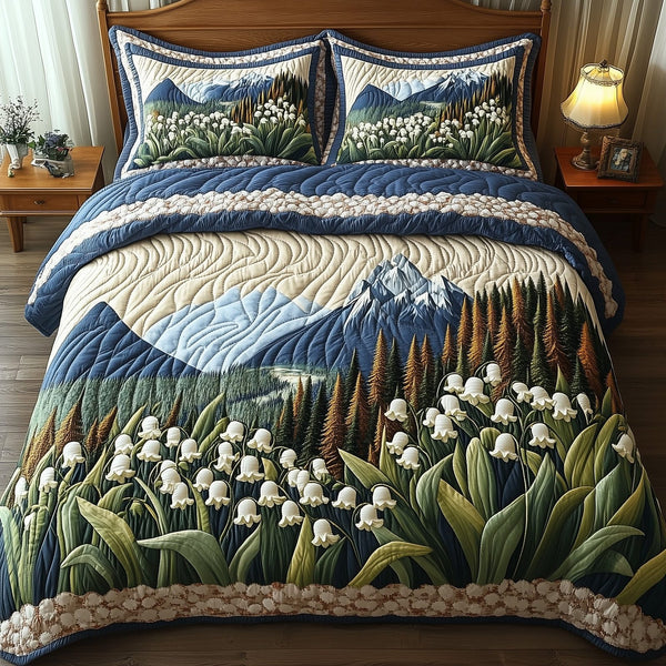 Whispers of the Valley quilted 3-piece bedding set on a made bed with two matching pillow shams