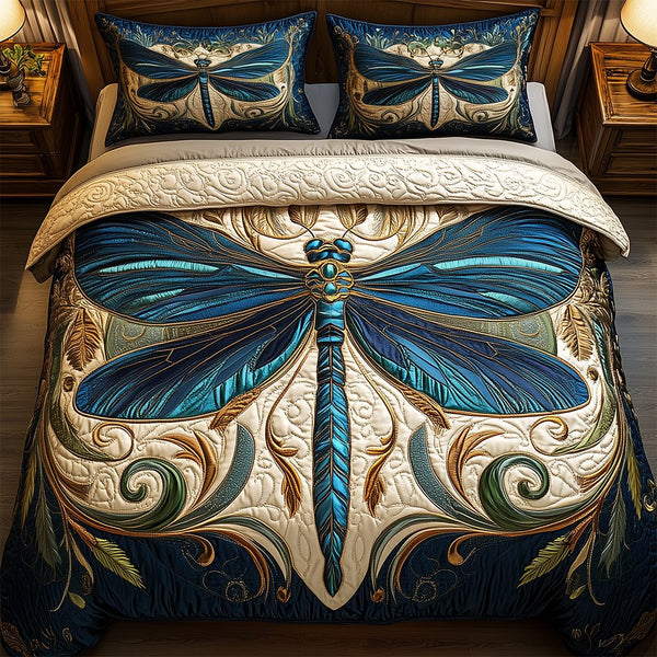 Whispers of the Wind quilted 3-piece bedding set on a made bed with two matching pillow shams