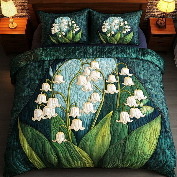 White Bliss quilted 3-piece bedding set on a made bed with two matching pillow shams