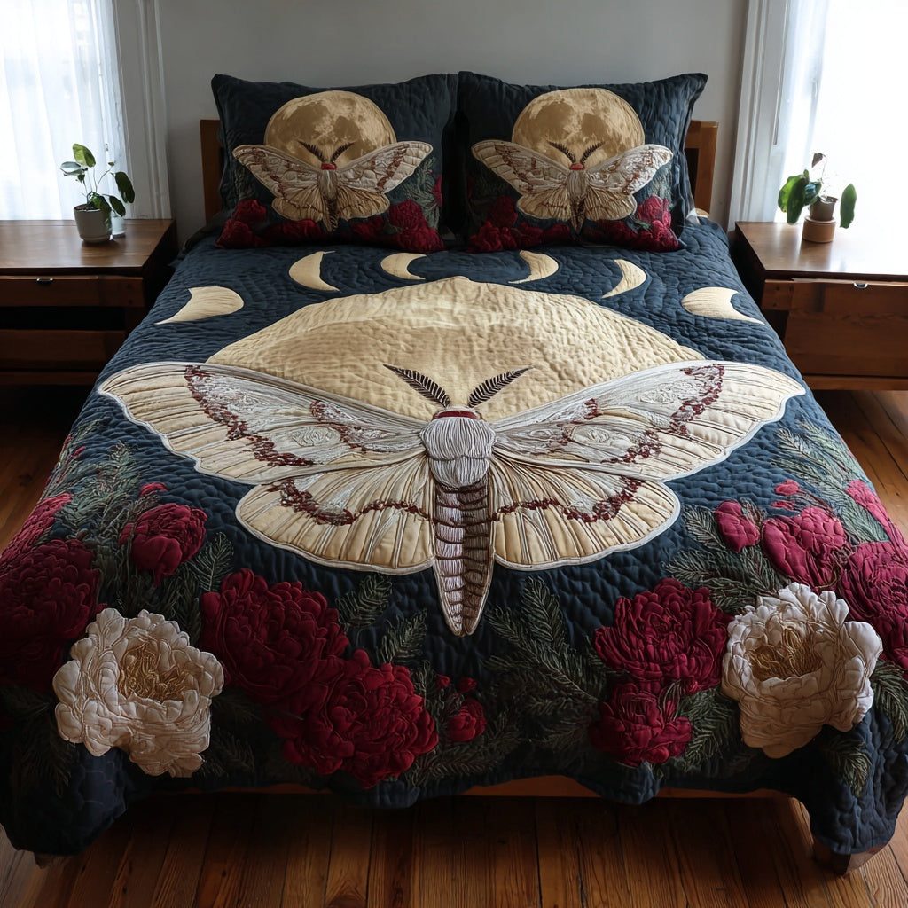 White Moth quilted 3-piece bedding set on a made bed with two matching pillow shams