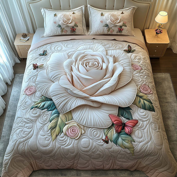 White Rose quilted 3-piece bedding set on a made bed with two matching pillow shams