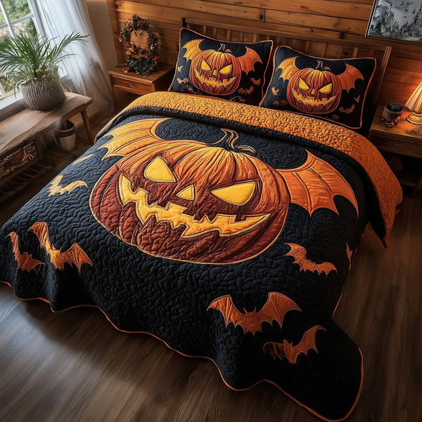 Wicked Pumpkin Glow quilted 3-piece bedding set on a made bed against a dark styled interior