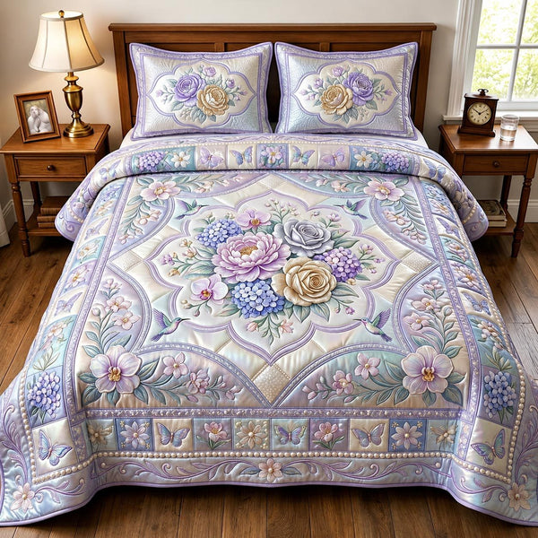 Wild Bloom quilted 3-piece bedding set on a made bed with two matching pillow shams