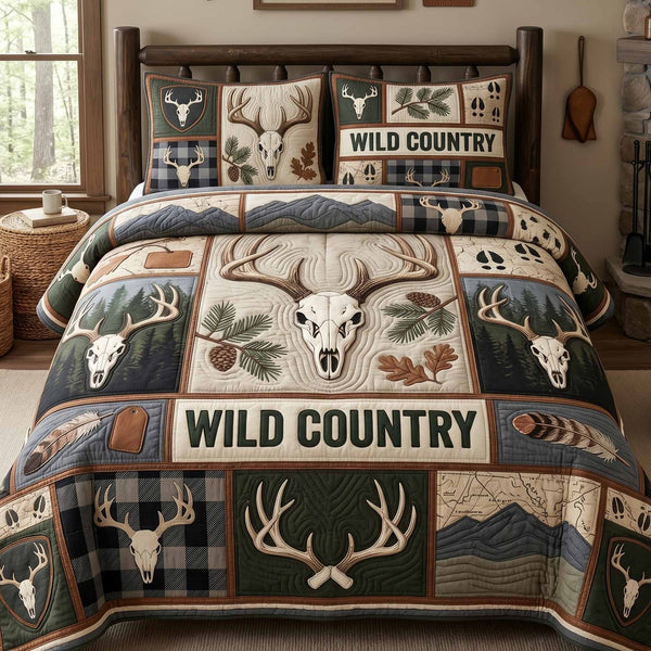 Wild Country quilted 3-piece bedding set on a made bed in a farmhouse bedroom
