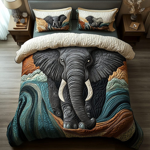 Wild Elephant quilted 3-piece bedding set on a made bed with two matching pillow shams