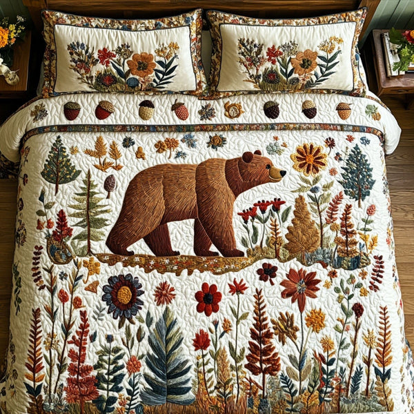 Wild Haven quilted 3-piece bedding set on a made bed with two matching pillow shams