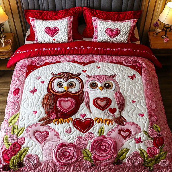 Wild Hearts quilted 3-piece bedding set on a made bed with two matching pillow shams