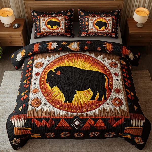 Wild Plains Legacy quilted 3-piece bedding set on a made bed with two matching pillow shams