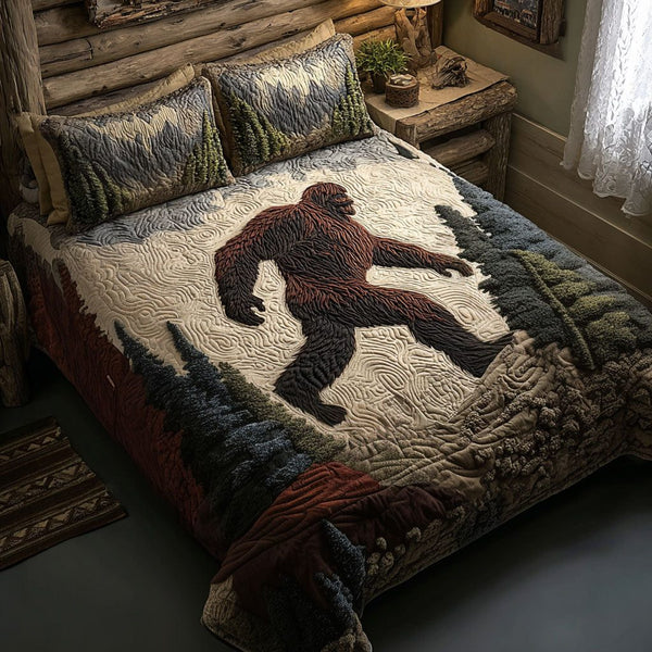 Wild Ridge Guardian quilted 3-piece bedding set on a made bed with two matching pillow shams