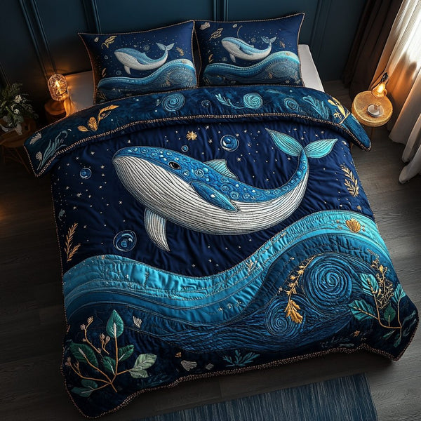 Wild Whale quilted 3-piece bedding set on a made bed in a light coastal bedroom