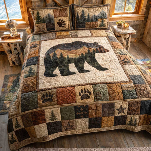 Wilderness Bear quilted 3-piece bedding set on a made bed with two matching pillow shams