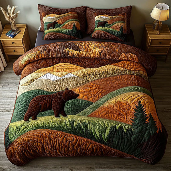 Wilderness Path quilted 3-piece bedding set on a made bed with two matching pillow shams