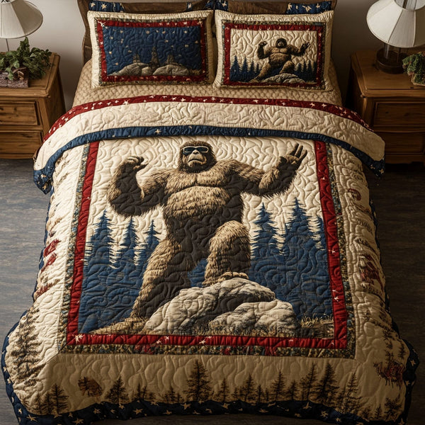 Wilderness Patriot quilted 3-piece bedding set on a made bed in a warmly lit bedroom