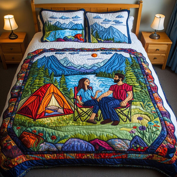 Wilderness Romance quilted 3-piece bedding set on a made bed with two matching pillow shams