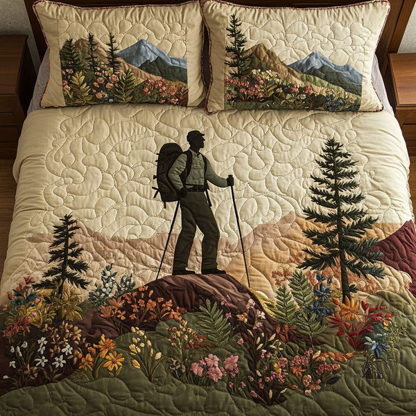 Wilderness Walk quilted 3-piece bedding set on a made bed with two matching pillow shams