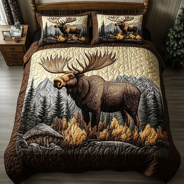 Wilderness Wanderer quilted 3-piece bedding set on a made bed with two matching pillow shams