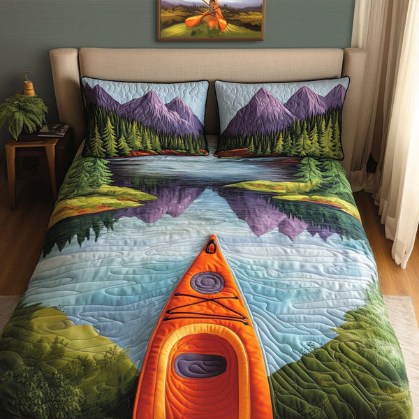 Wilderness Waters quilted 3-piece bedding set on a made bed with two matching pillow shams