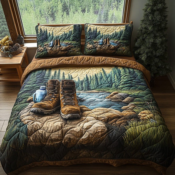 Wilderness Way quilted 3-piece bedding set on a made bed with two matching pillow shams