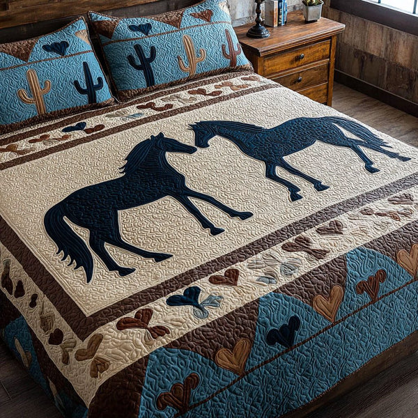 Wildfire Hearts quilted 3-piece bedding set on a made bed with two matching pillow shams