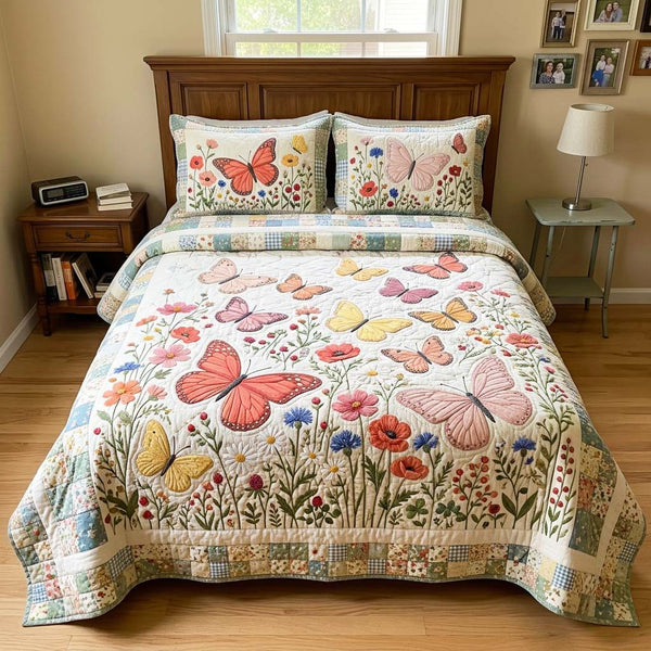 Wildflower Butterfly quilted 3-piece bedding set on a made bed with two matching pillow shams
