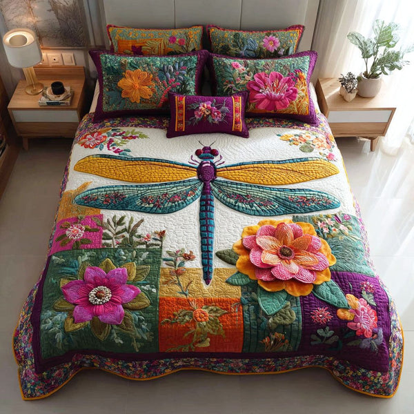 Wildflower Dragonfly quilted 3-piece bedding set on a made bed with two matching pillow shams