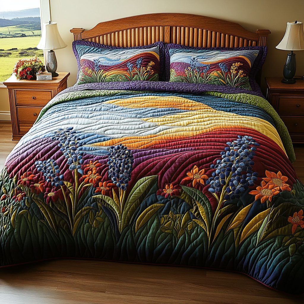 Wildflower Dreamscape quilted 3-piece bedding set on a made bed with two matching pillow shams