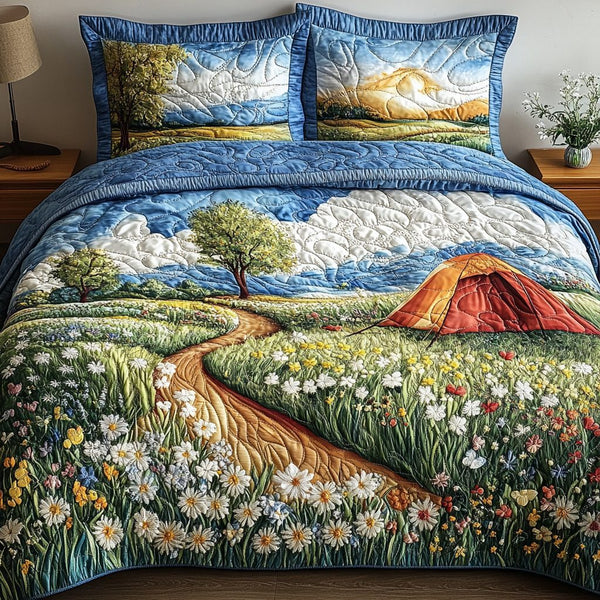 Wildflower Haven quilted 3-piece bedding set on a made bed with two matching pillow shams