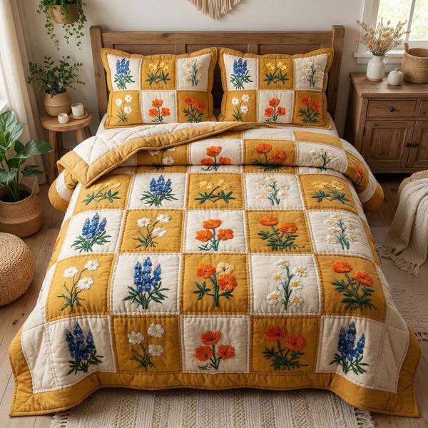 Wildflower Meadow quilted 3-piece bedding set on a made bed with two matching pillow shams