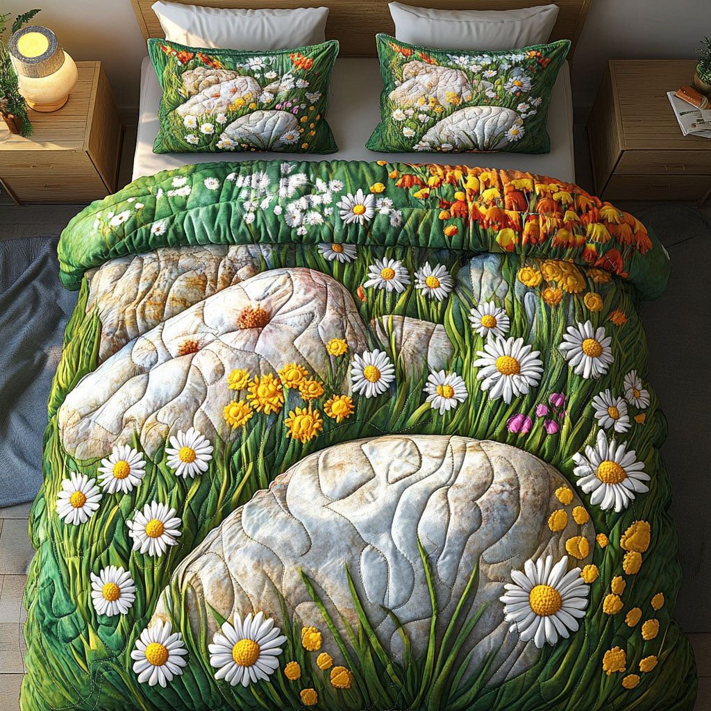 Wildflower Rocks quilted 3-piece bedding set on a made bed with two matching pillow shams