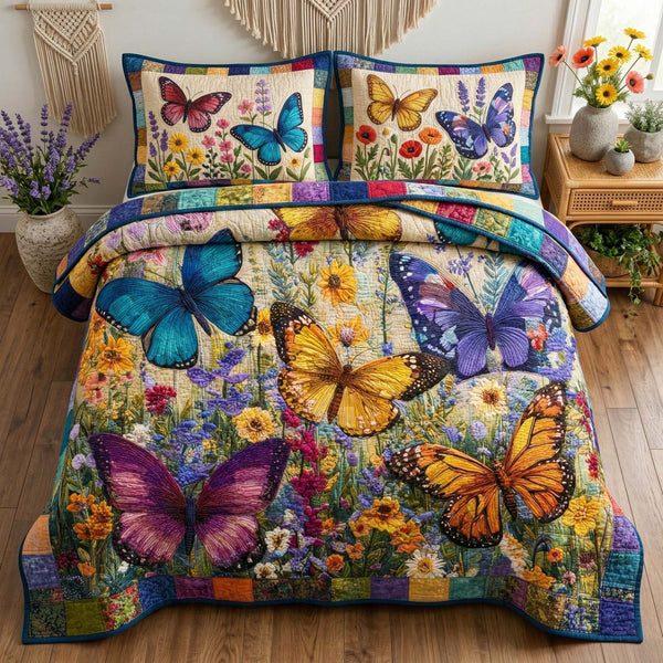 Wildflower Wings quilted 3-piece bedding set on a made bed with two matching pillow shams