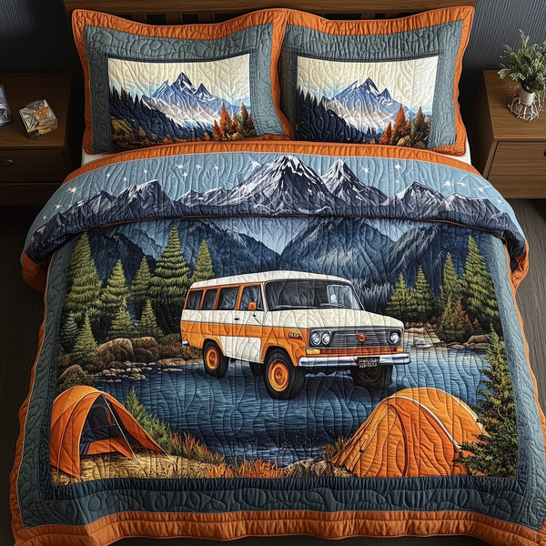 Wildwood Hideaway quilted 3-piece bedding set on a made bed with two matching pillow shams