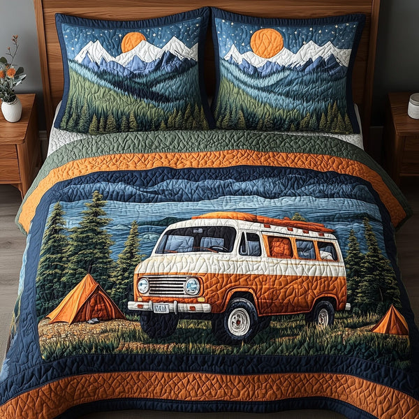 Wildwood Hideaway quilted 3-piece bedding set on a made bed with two matching pillow shams