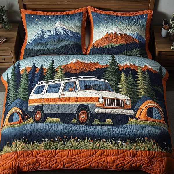Wildwood Hideaway quilted 3-piece bedding set on a made bed with two matching pillow shams