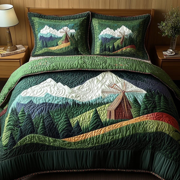 Windmill In Forest quilted 3-piece bedding set on a made bed with two matching pillow shams