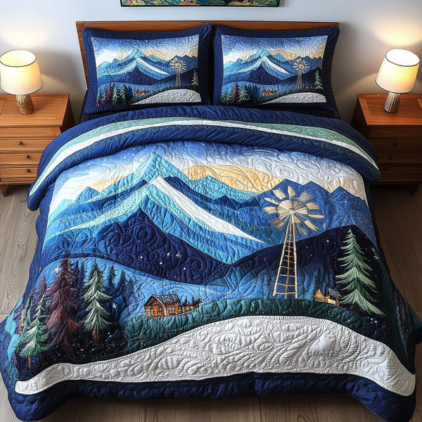 Windmill In Stillness quilted 3-piece bedding set on a made bed with two matching pillow shams